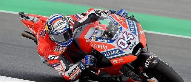 Dovizioso vence por delante de Lorenzo y Márquez