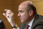 De Guindos asegura que basta con que el crédito no caiga o crezca 