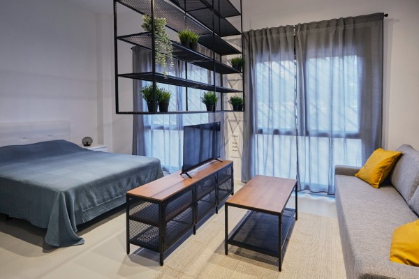 Así se ha convertido un bajo de Murcia en cuatro apartamentos de diseño muy bien aprovechados
