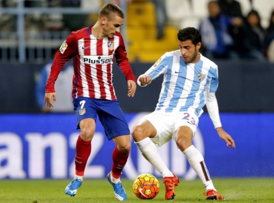 El Atlético, al acecho del liderato ante un Málaga salvado