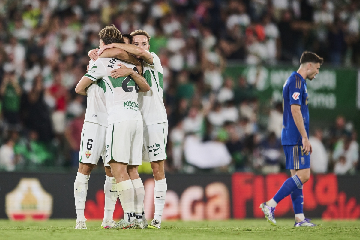 Pedro Bigas y David Affengruber se abrazan