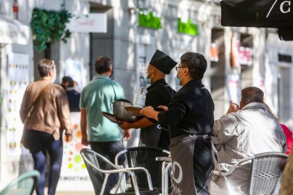 El BOE publica el real decreto para la regularización extraordinaria de migrantes