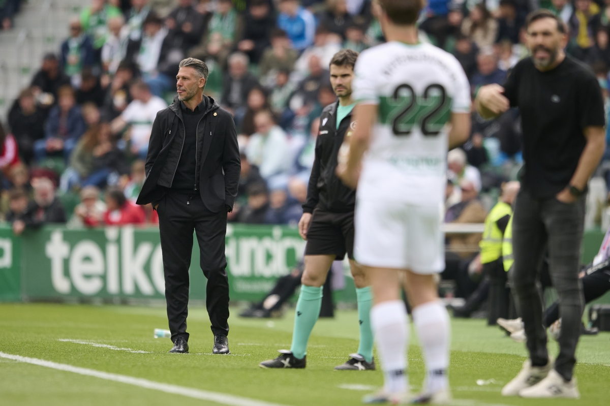 Demichelis y Sarbia en la banda