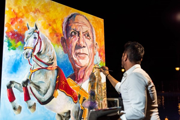 El artista Tachi pintará en directo un gran lienzo de les Escoles Velles en el acto central de la XV Setmana Cultural