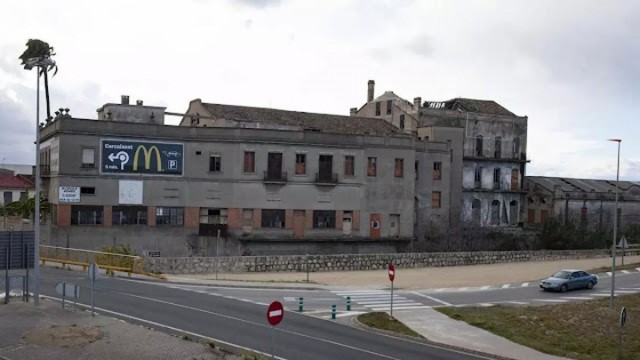 El antiguo molino de Alzira deja de estar protegido para poder encauzar el barranco de la Casella