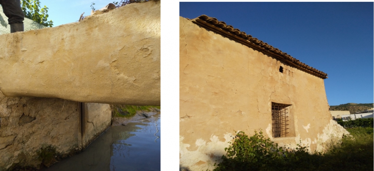 Canal de riego labrado en piedra de arenisca y enfoscado de fachada casa huerta siglo XVIII.  