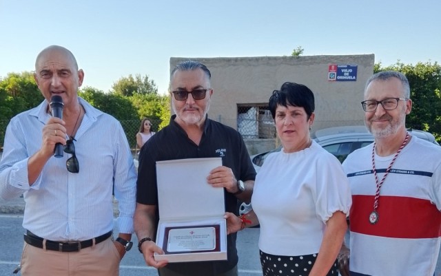 Torreagüera rinde homenaje a su patrón y reconoce a la ONG Azul en Acción con la Cruz Hospitalaria al mérito social
