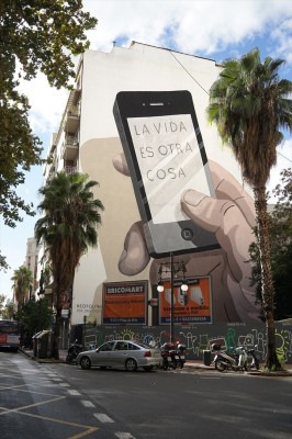 Escif critica la sustitución de uno de sus murales por una publicidad: 
