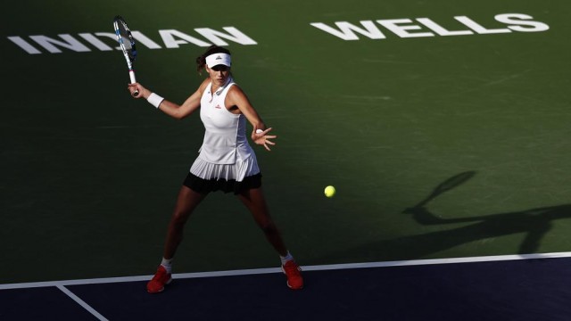 Muguruza remonta a Day y buscará los cuartos ante Svitolina