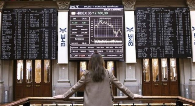 El Ibex cotiza casi en tablas a media sesión y sigue afincado en los 6.900 puntos 