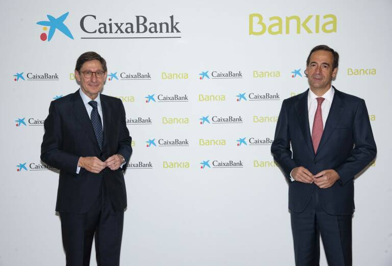 José Ignacio Goirigolzarri y Gonzalo Gortázar. Foto: CAIXABANK/BANKIA - 