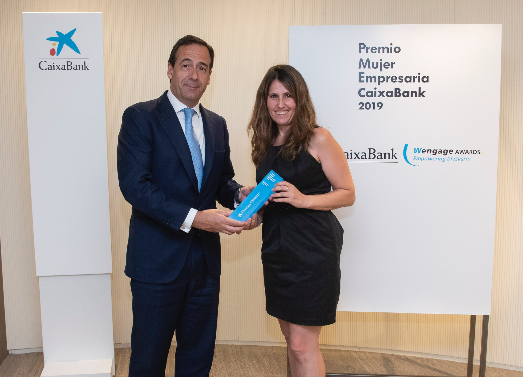 Gonzalo Gortazar, CEO de CaixaBank y Ángela Pérez de Imegen  - 