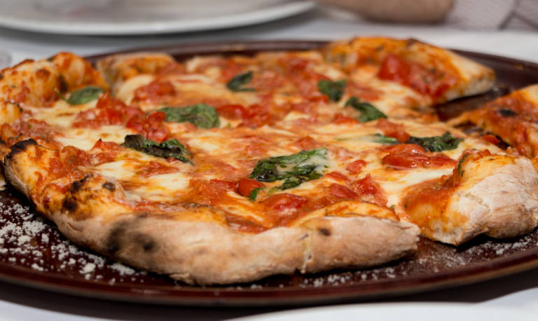 ¿Hasta cuánto podemos bajar el precio de la pizza?