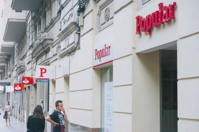 El ERE de Popular se cierra con la salida de 2.592 empleados después de ser adquirido por Santander
