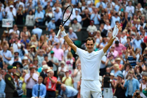 Federer vence a un Cilic lesionado y gana Wimbledon por octava vez
