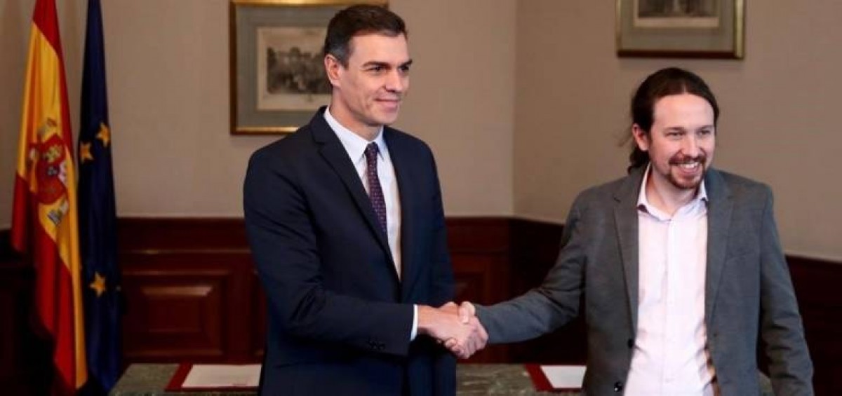 Pedro Sánchez (izq.) y Pablo Iglesias. Foto Sergio Pérez (Reuters) - 