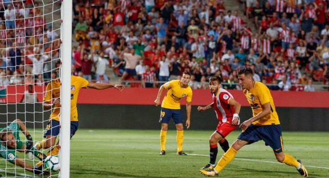 Atlético iguala un 2-0 en Girona en el tramo final y con diez jugadores 