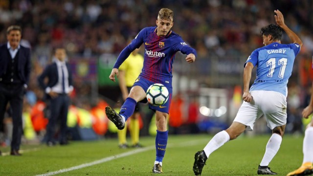 El Barcelona, a medio gas, supera al Málaga y se mantiene firme como líder