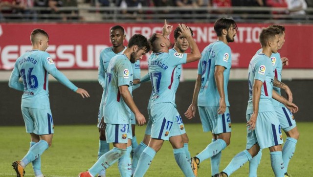 Barcelona, Betis y Sevilla encarrilan su pase, el Málaga se hunde