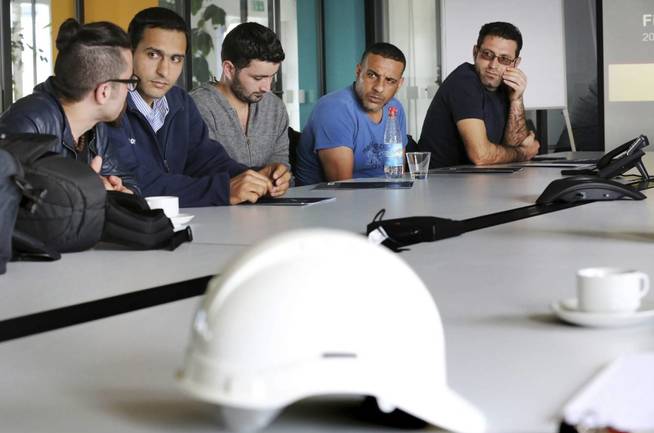 Un grupo de trabajadores en un curso de formación. Foto: EFE - 