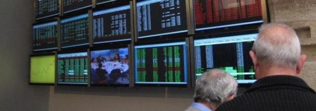 Compás de espera en la bolsa española a media sesión